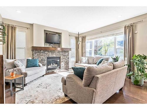 5 Cimarron Springs Court, Okotoks, AB - Indoor Photo Showing Living Room With Fireplace