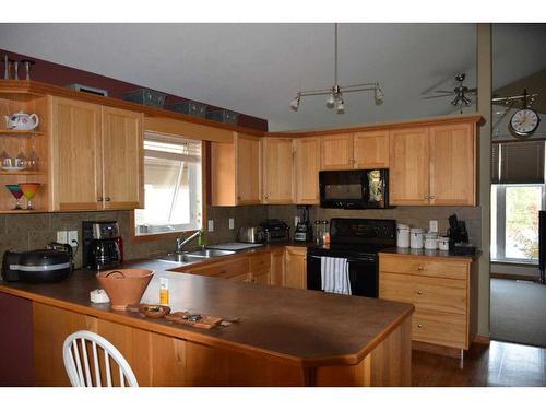 48 Wade Close, Red Deer, AB - Indoor Photo Showing Kitchen With Double Sink