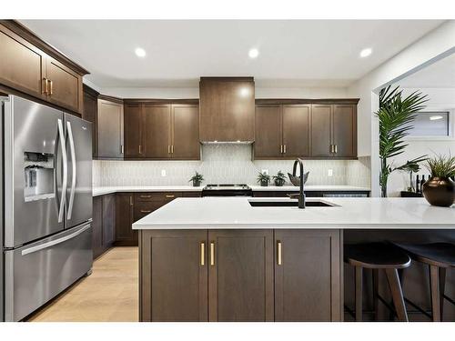 211 Marina Cove Se, Calgary, AB - Indoor Photo Showing Kitchen With Double Sink With Upgraded Kitchen