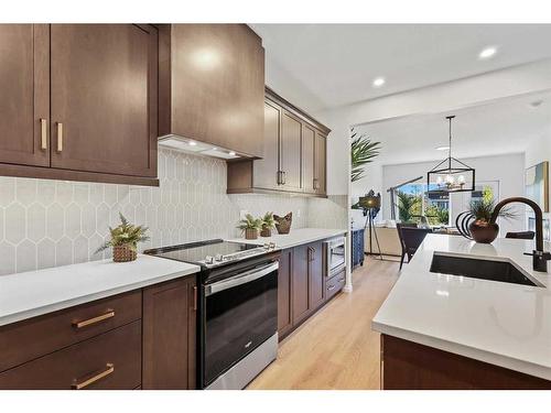 211 Marina Cove Se, Calgary, AB - Indoor Photo Showing Kitchen With Upgraded Kitchen