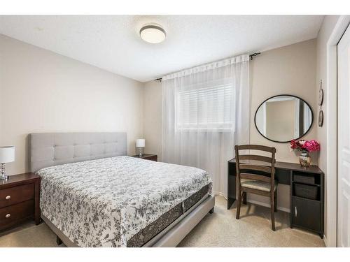 13 Brightondale Park Se, Calgary, AB - Indoor Photo Showing Bedroom