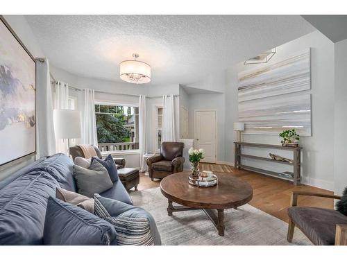 15 Cougar Ridge View Sw, Calgary, AB - Indoor Photo Showing Living Room