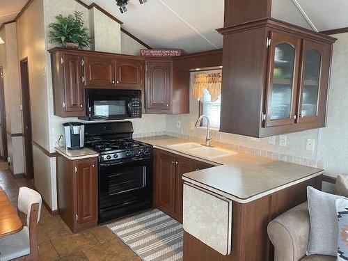 61 Cormorant Crescent, Rural Vulcan County, AB - Indoor Photo Showing Kitchen