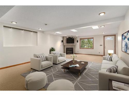 155 Macewan Park Rise Nw, Calgary, AB - Indoor Photo Showing Living Room With Fireplace