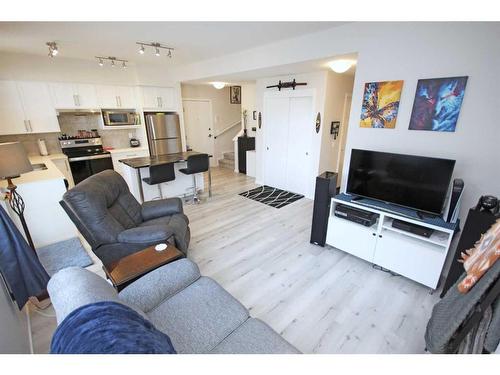 204-245 Redstone Walk Ne, Calgary, AB - Indoor Photo Showing Living Room