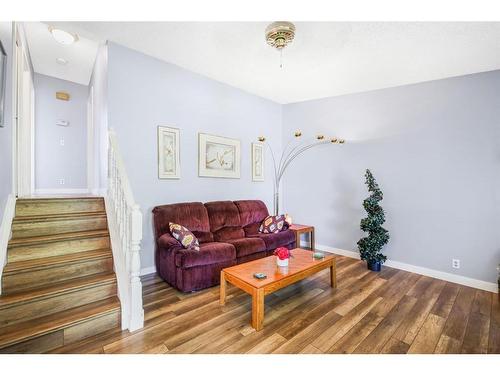 271 Deersaxon Circle Se, Calgary, AB - Indoor Photo Showing Living Room