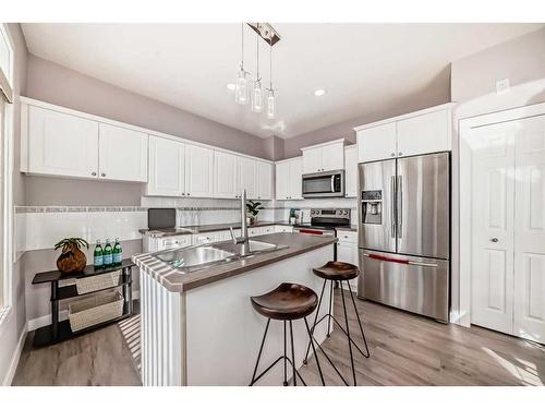 32-7401 Springbank Boulevard Sw, Calgary, AB - Indoor Photo Showing Kitchen