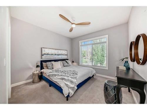 32-7401 Springbank Boulevard Sw, Calgary, AB - Indoor Photo Showing Bedroom