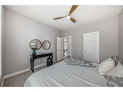 32-7401 Springbank Boulevard Sw, Calgary, AB - Indoor Photo Showing Bedroom