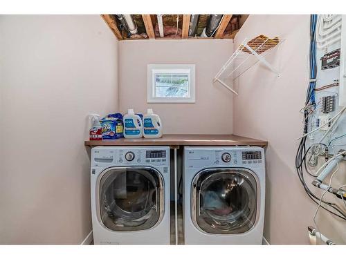 32-7401 Springbank Boulevard Sw, Calgary, AB - Indoor Photo Showing Laundry Room