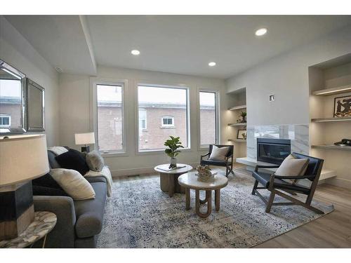 2222 5 Street Sw, Calgary, AB - Indoor Photo Showing Living Room With Fireplace