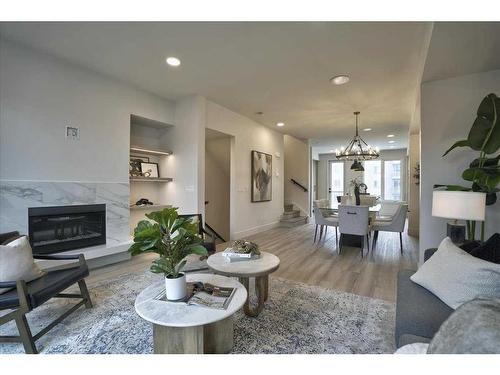 2222 5 Street Sw, Calgary, AB - Indoor Photo Showing Living Room With Fireplace