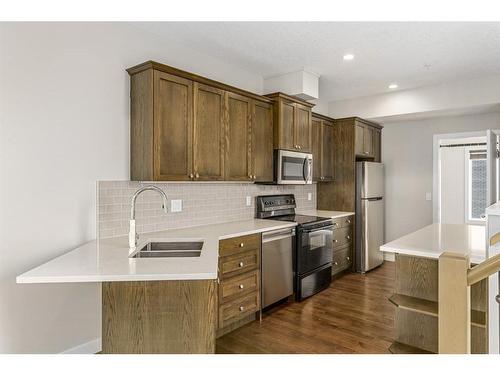 1303 7 Street Sw, Calgary, AB - Indoor Photo Showing Kitchen With Stainless Steel Kitchen With Double Sink