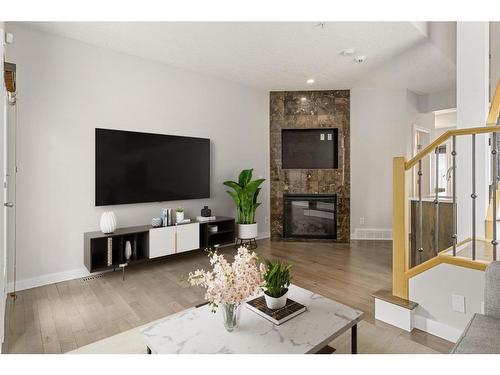 1303 7 Street Sw, Calgary, AB - Indoor Photo Showing Living Room With Fireplace