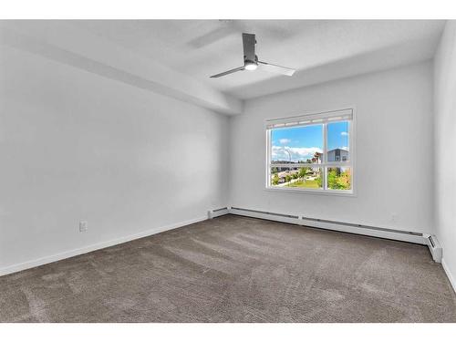 201-100 Harvest Hills Place Ne, Calgary, AB - Indoor Photo Showing Other Room