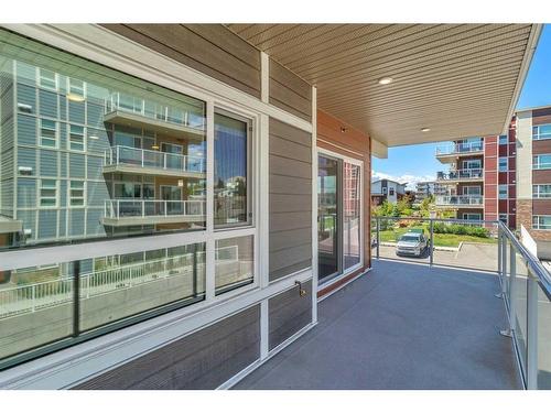 201-100 Harvest Hills Place Ne, Calgary, AB - Outdoor With Balcony With Exterior