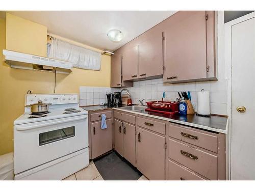 2522 10 Avenue Se, Calgary, AB - Indoor Photo Showing Kitchen With Double Sink