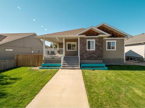 148 Heritage Rd, Magrath, AB - Outdoor With Deck Patio Veranda