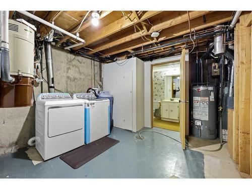 7143 18 Street Se, Calgary, AB - Indoor Photo Showing Laundry Room