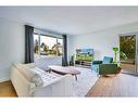 7143 18 Street Se, Calgary, AB  - Indoor Photo Showing Living Room 