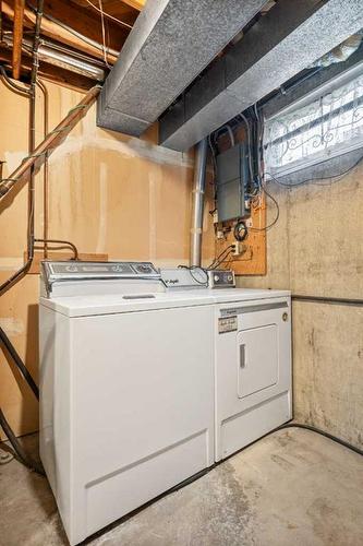 5711 Dalmead Crescent Nw, Calgary, AB - Indoor Photo Showing Laundry Room