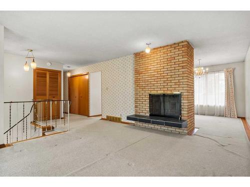 5711 Dalmead Crescent Nw, Calgary, AB - Indoor With Fireplace