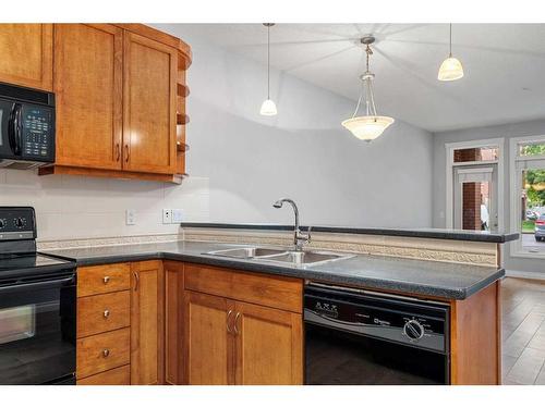 1107-24 Hemlock Crescent Sw, Calgary, AB - Indoor Photo Showing Kitchen With Double Sink