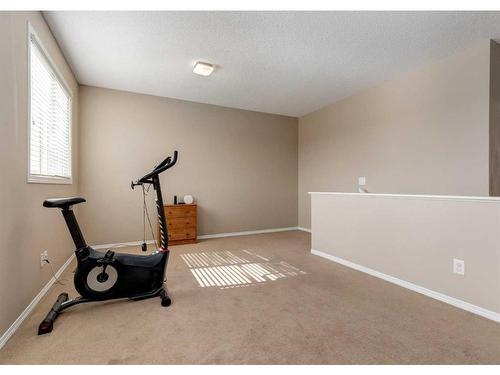 2080 Reunion Boulevard Nw, Airdrie, AB - Indoor Photo Showing Gym Room