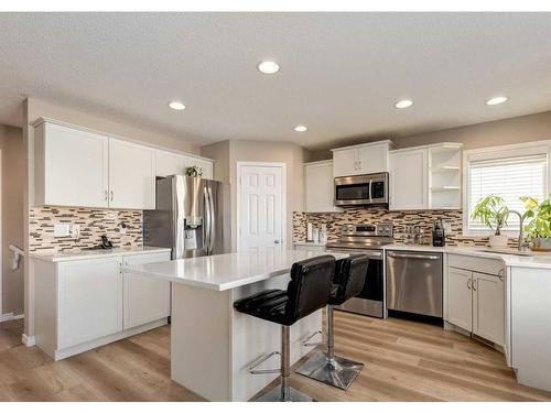 2080 Reunion Boulevard Nw, Airdrie, AB - Indoor Photo Showing Kitchen With Stainless Steel Kitchen With Double Sink With Upgraded Kitchen