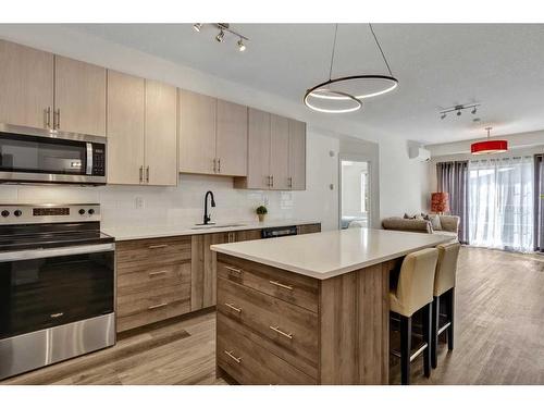 3417-298 Sage Meadows Park Nw, Calgary, AB - Indoor Photo Showing Kitchen With Stainless Steel Kitchen