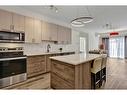 3417-298 Sage Meadows Park Nw, Calgary, AB  - Indoor Photo Showing Kitchen With Stainless Steel Kitchen 