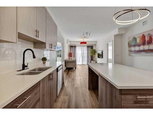 3417-298 Sage Meadows Park Nw, Calgary, AB - Indoor Photo Showing Kitchen With Double Sink