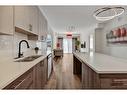 3417-298 Sage Meadows Park Nw, Calgary, AB  - Indoor Photo Showing Kitchen With Double Sink 