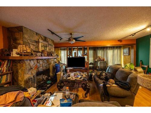 4-722 4A Street Ne, Calgary, AB - Indoor Photo Showing Other Room With Fireplace