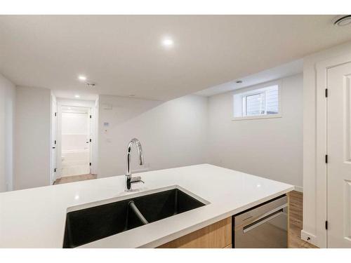 8 Royston Walk Nw, Calgary, AB - Indoor Photo Showing Kitchen With Double Sink