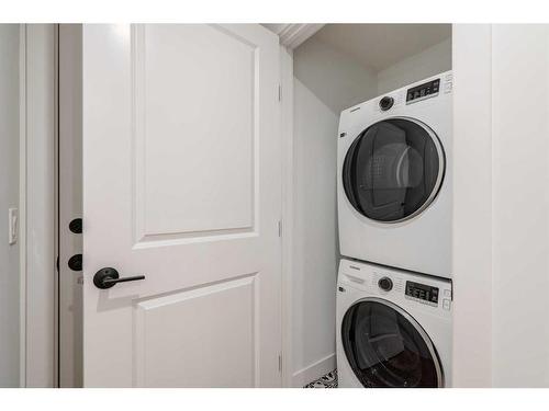 8 Royston Walk Nw, Calgary, AB - Indoor Photo Showing Laundry Room