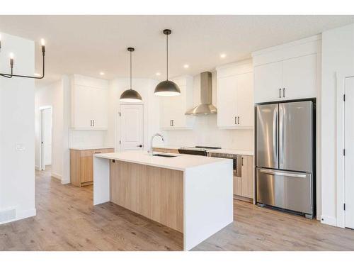 8 Royston Walk Nw, Calgary, AB - Indoor Photo Showing Kitchen With Upgraded Kitchen