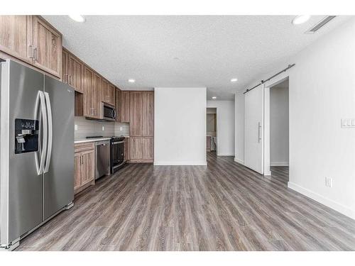 2214-350 Livingston Common Ne, Calgary, AB - Indoor Photo Showing Kitchen With Stainless Steel Kitchen