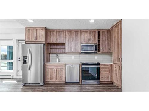 2214-350 Livingston Common Ne, Calgary, AB - Indoor Photo Showing Kitchen With Stainless Steel Kitchen