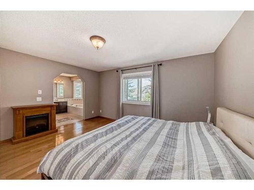 8 Arbour Glen Close Nw, Calgary, AB - Indoor Photo Showing Bedroom