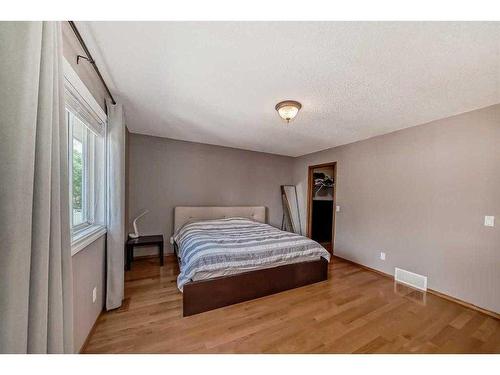 8 Arbour Glen Close Nw, Calgary, AB - Indoor Photo Showing Bedroom