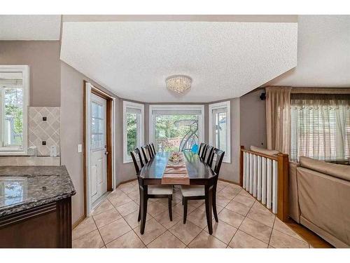 8 Arbour Glen Close Nw, Calgary, AB - Indoor Photo Showing Dining Room