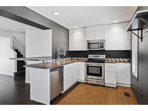 3338 New Brighton Gardens Se, Calgary, AB - Indoor Photo Showing Kitchen With Stainless Steel Kitchen With Upgraded Kitchen