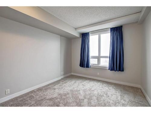 617-8710 Horton Road Sw, Calgary, AB - Indoor Photo Showing Other Room