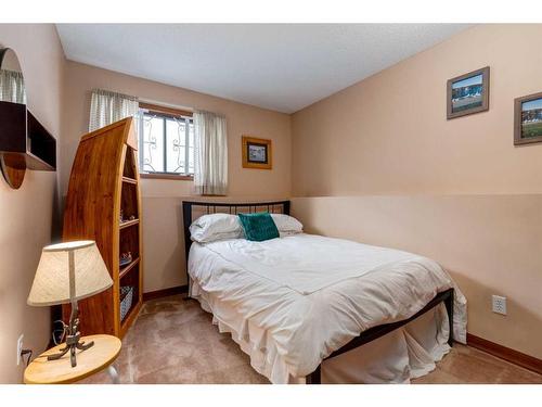 107 Scenic Glen Place Nw, Calgary, AB - Indoor Photo Showing Bedroom