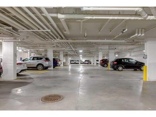 301-383 Smith Street Nw, Calgary, AB - Indoor Photo Showing Garage