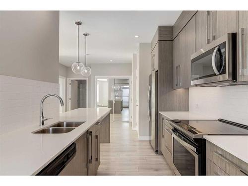 301-383 Smith Street Nw, Calgary, AB - Indoor Photo Showing Kitchen With Double Sink With Upgraded Kitchen