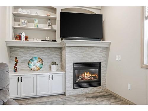 41 Thornbird Rise, Airdrie, AB - Indoor Photo Showing Living Room With Fireplace