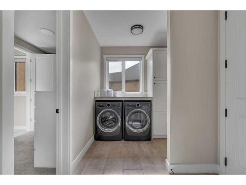 124 Cranbrook View Se, Calgary, AB - Indoor Photo Showing Laundry Room