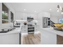 616 Cedarille Way Sw, Calgary, AB  - Indoor Photo Showing Kitchen With Stainless Steel Kitchen With Upgraded Kitchen 